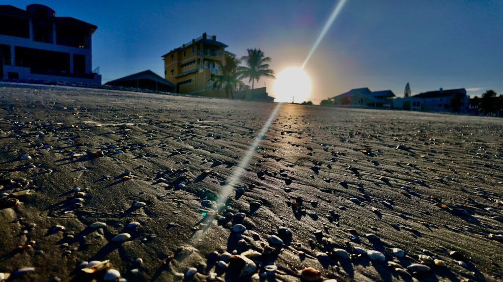Cinematic beach house landscape at sunset in Southwest Florida, representing private photography commissions and legacy film services by Corey Ground & Air Ops.